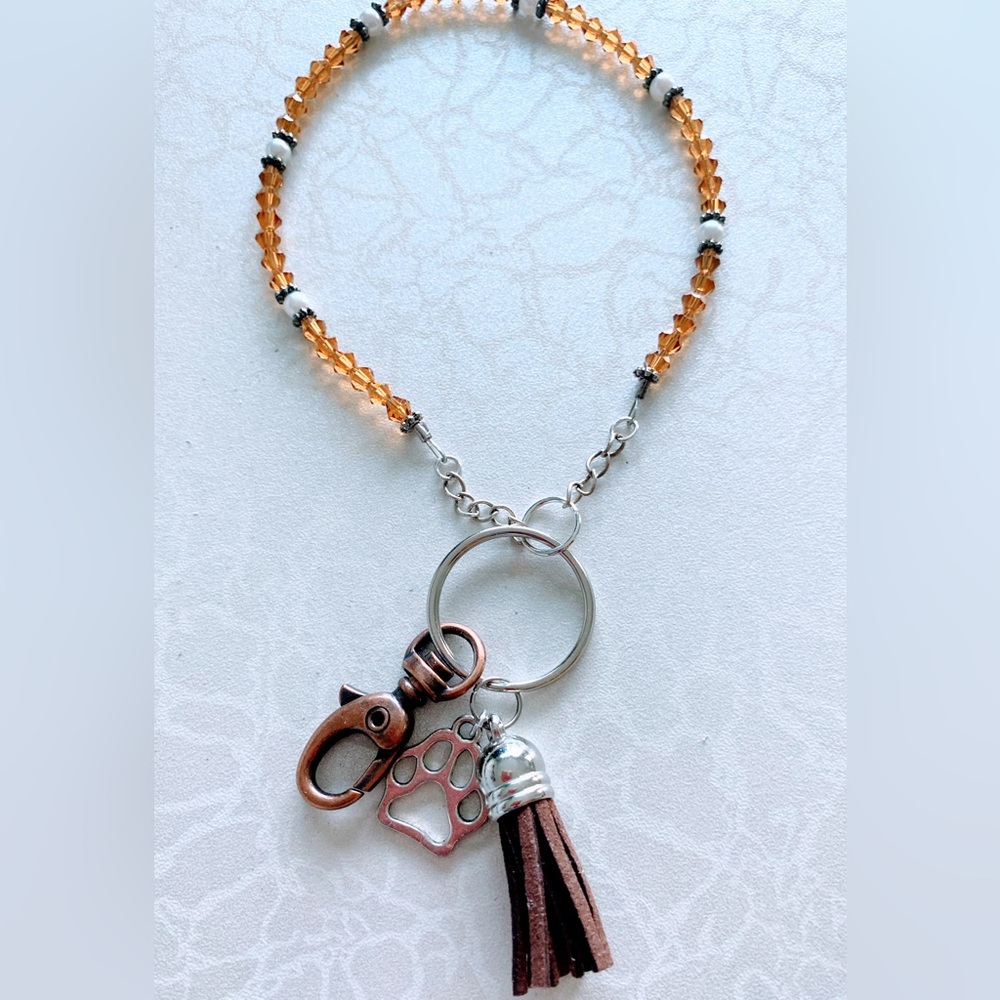 Crystal Beaded Keychain with Paw Charm and brown tassel